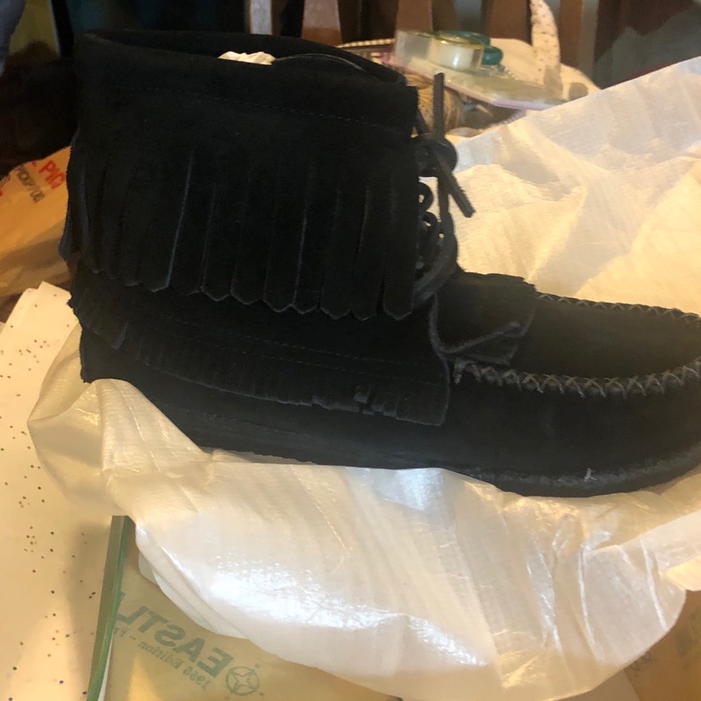 Boots with fringe.